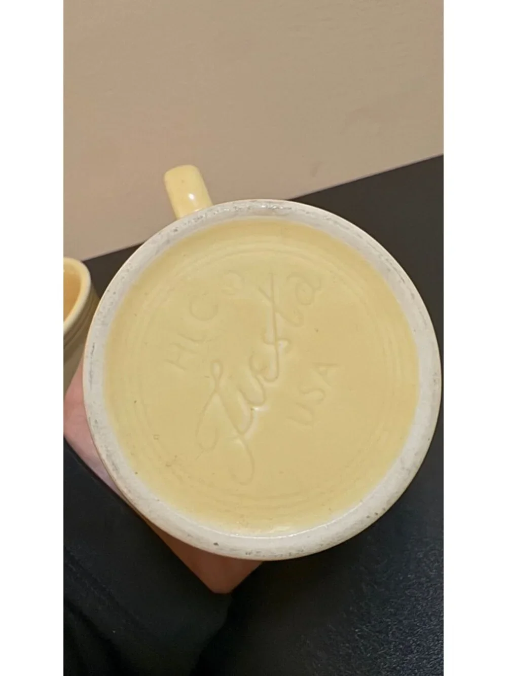 Pair of Fiesta Ware mugs in a light yellow glaze